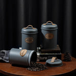 Load image into Gallery viewer, Rustic Charm Metallic Kitchen Storage Jar Set – Coffee, Tea, Sugar (Set of 3)